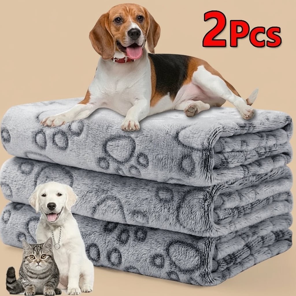 Two gray pet blankets pawfectos blankets paw prints, one folded and one with a dog and cat on a white background.