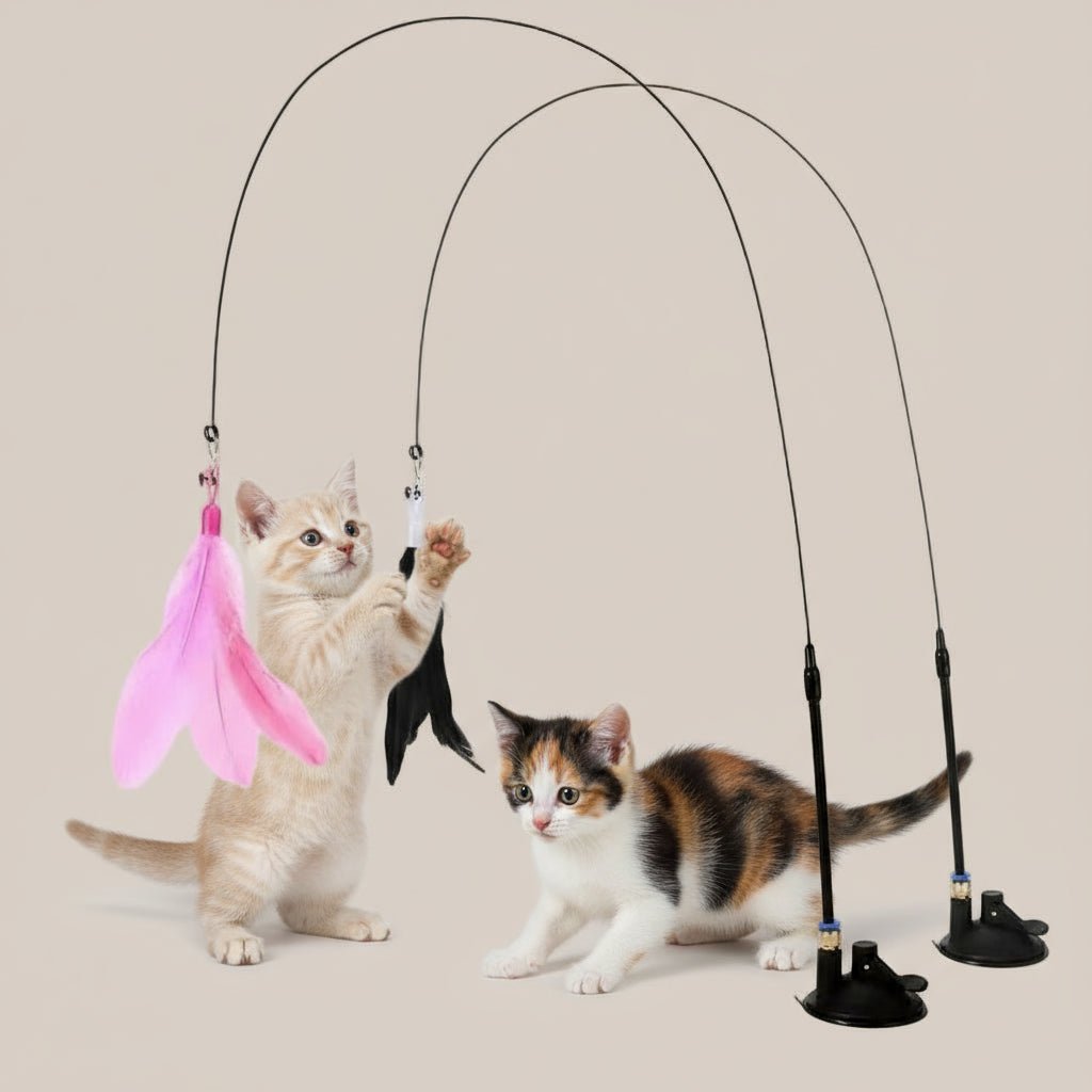 Cat toy with pink and black feathers on a gray background