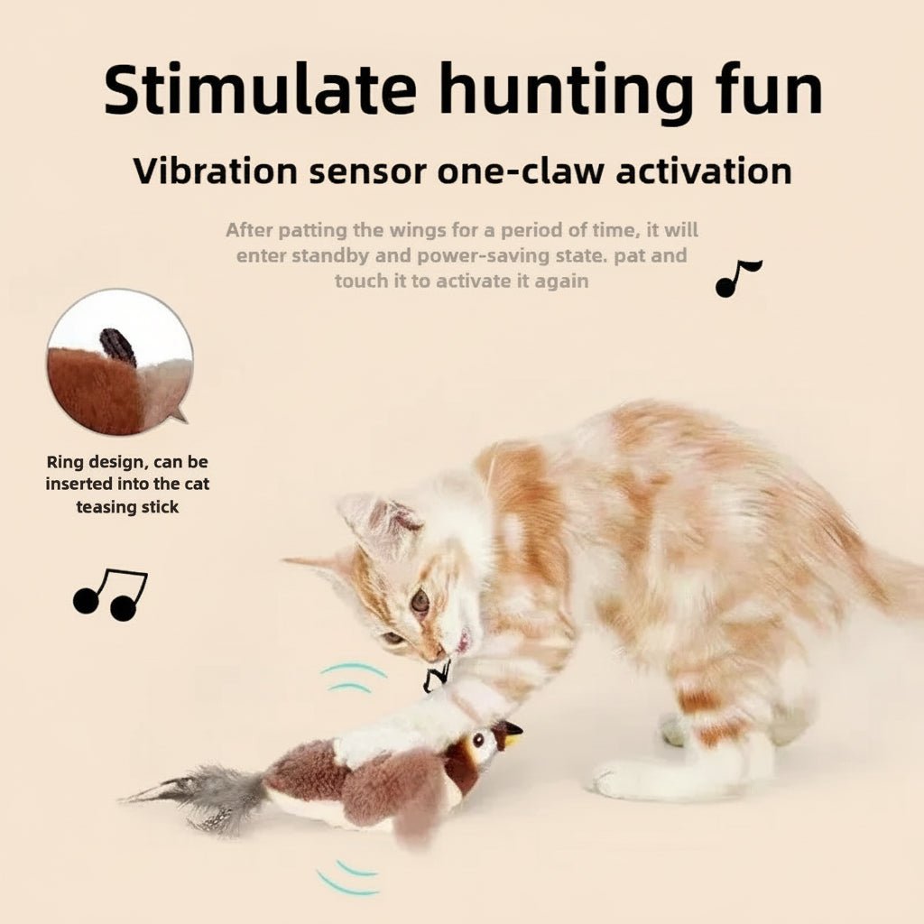 Cat playing with a flapping bird toy 